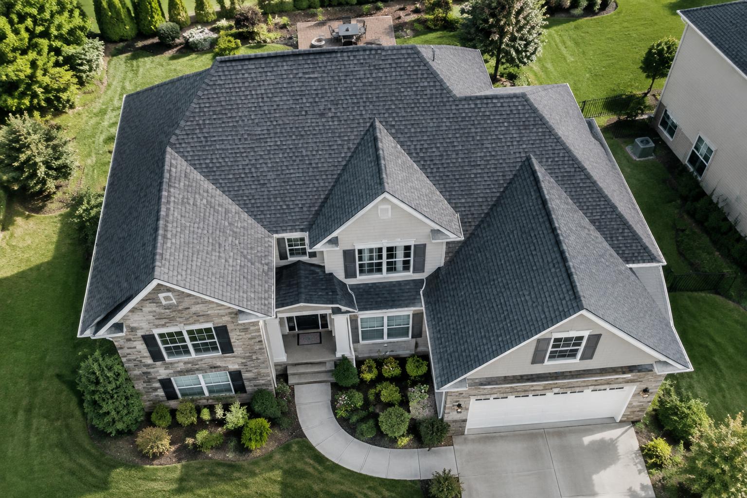 Aerial view of a newly replaced shingle roof